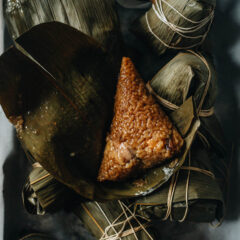 Savory zongzi on bamboo leaves